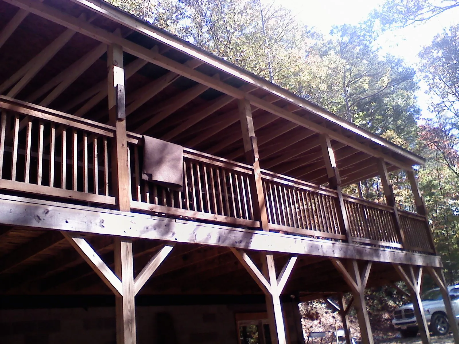 Timber framing under a new elevated porch and deck — Roof Leak Repair in North Andover by Roofing Brothers